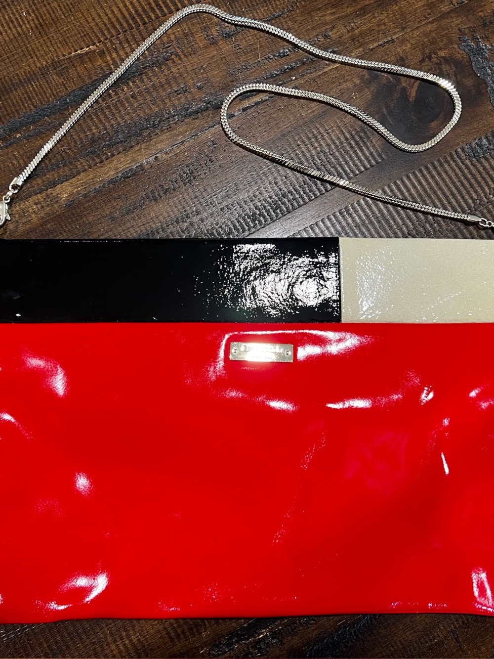 kate spade Black and Cream Patent Stripe Interior Clutch